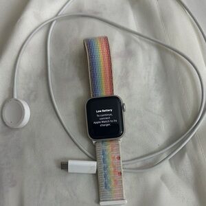 Apple Watch SE GPS, 40mm Starlight Aluminum Case with Pride Edition Sport Loop